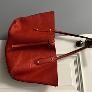 handles have some damage but tote looks brand new inside and out